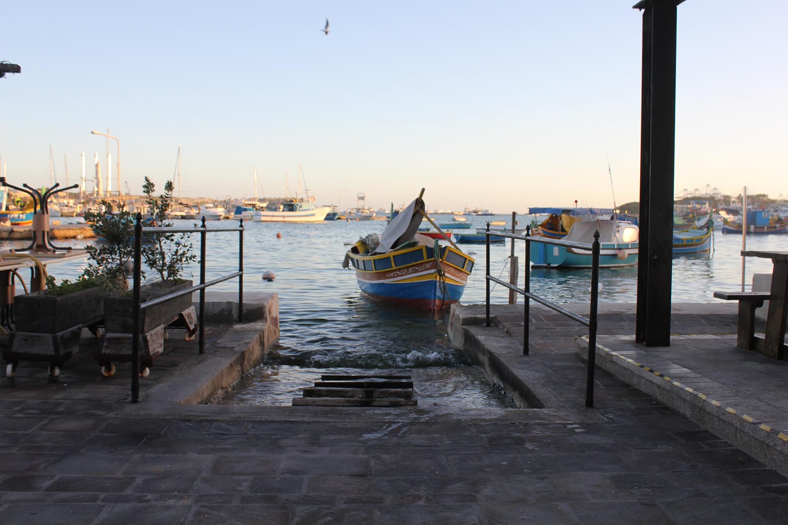 A traditional luzzu boat at Marsaxlokk harbour, Malta