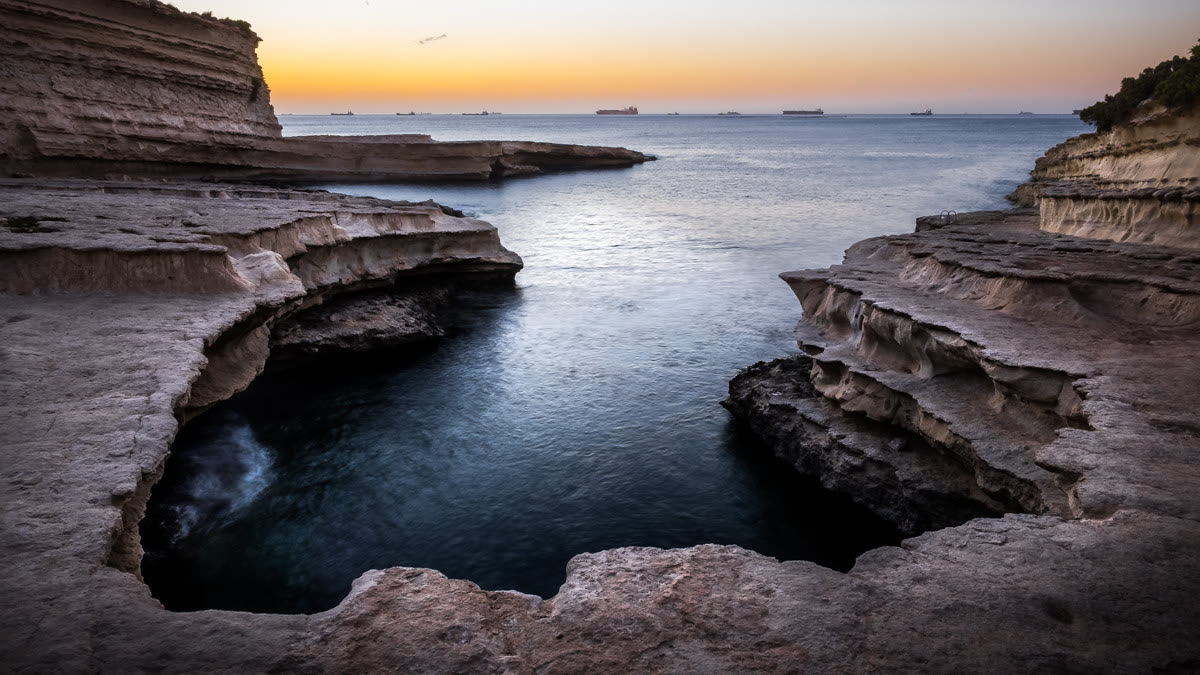 St Peter's Pool, a natural swimming pool at Delimara, Malta